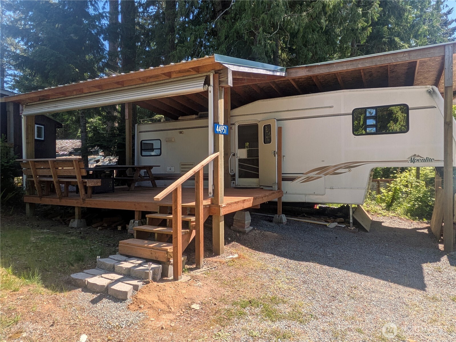 44957 Kachess Trail, Unit 2C97 Concrete, WA 98237 - Photo 2 of 16 a view of house with a large window and furniture