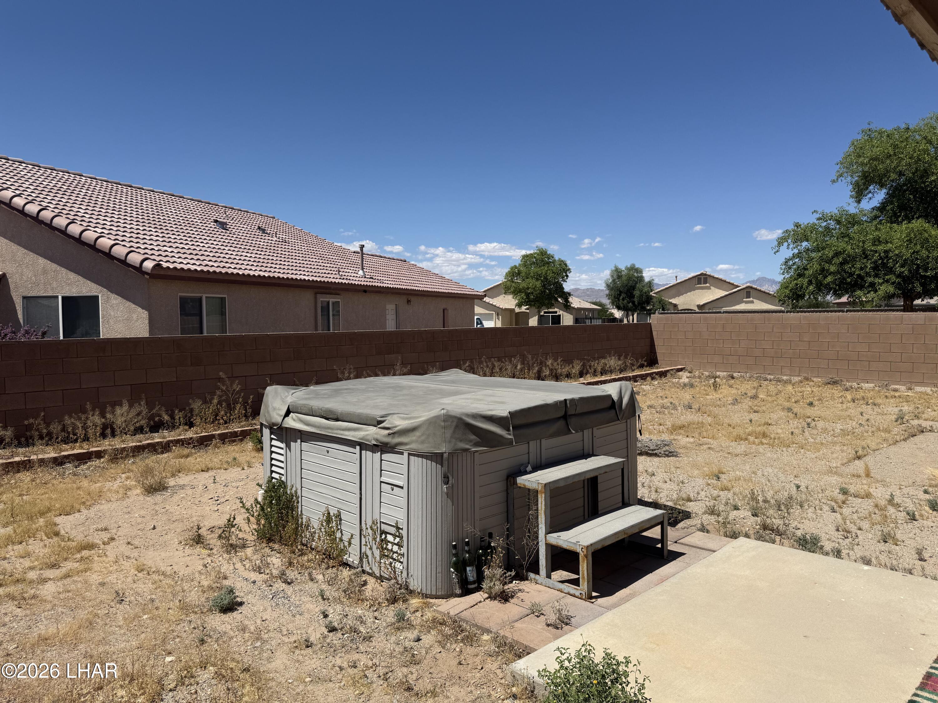4897 South Rinaldi Drive Fort Mohave, AZ 86426 - Photo 17 of 22 a view of a terrace with chairs
