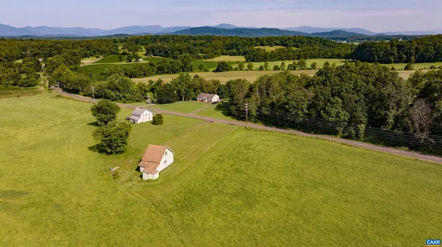 a view of a lake with a city