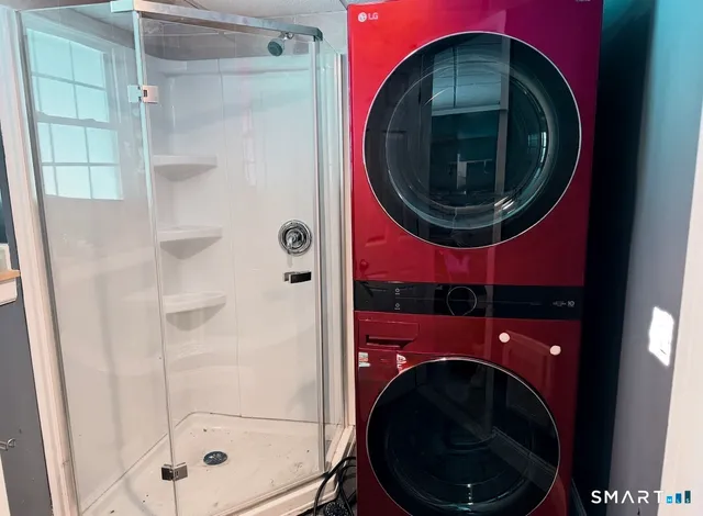 a utility room with dryer and washer