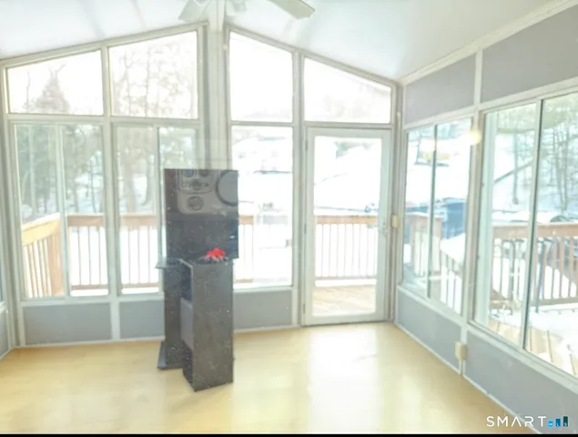 a view of empty room with windows