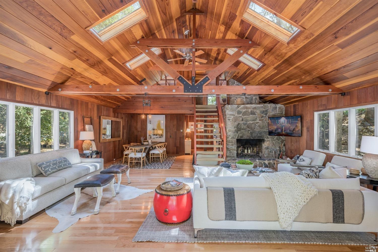 6200 Sharp Road Calistoga, CA 94515 - Photo 1 of 1 a living room with furniture and a chandelier