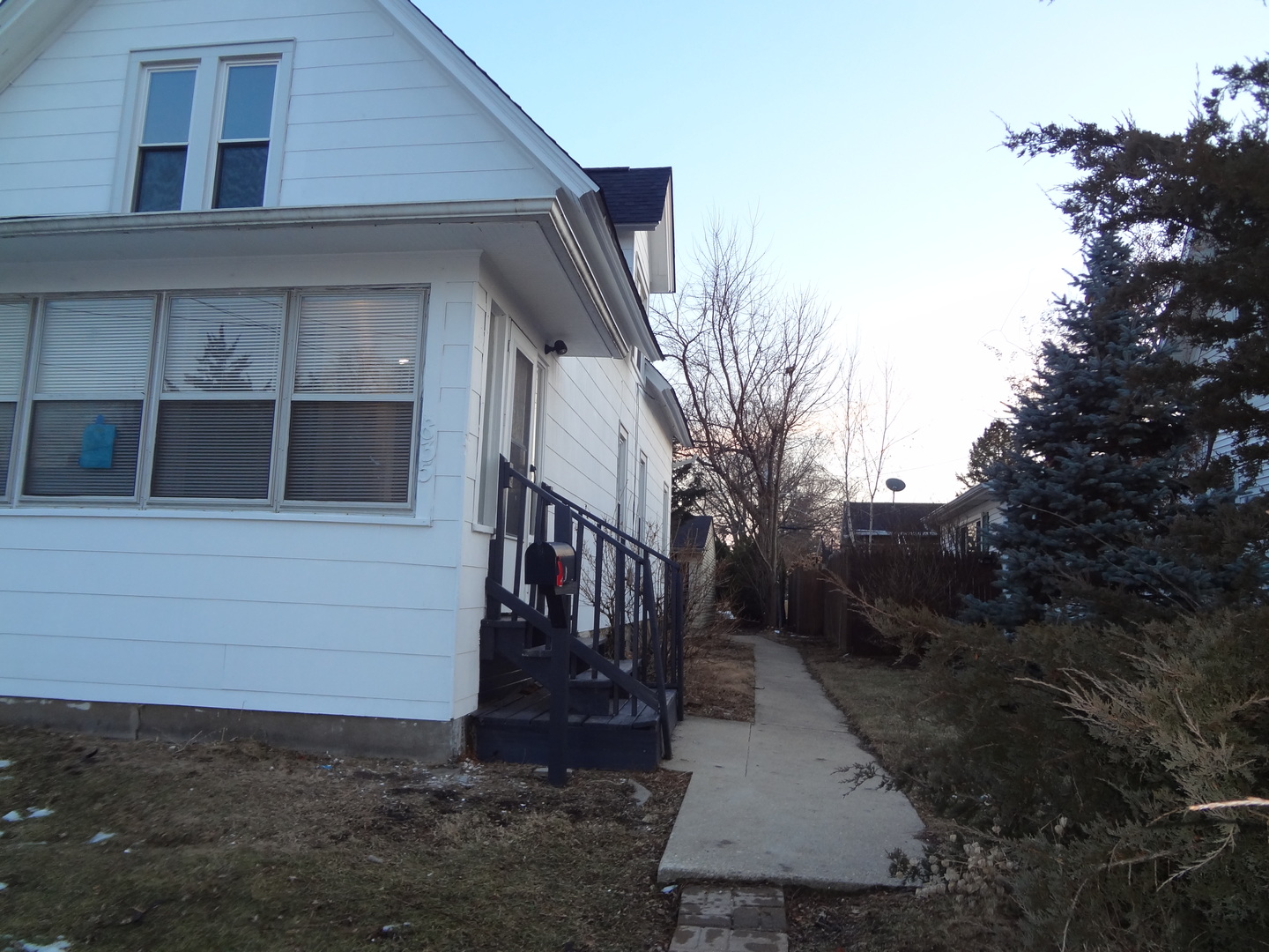 835 Oak Street Elgin, IL 60123 - Photo 2 of 45 a house with trees in front of it