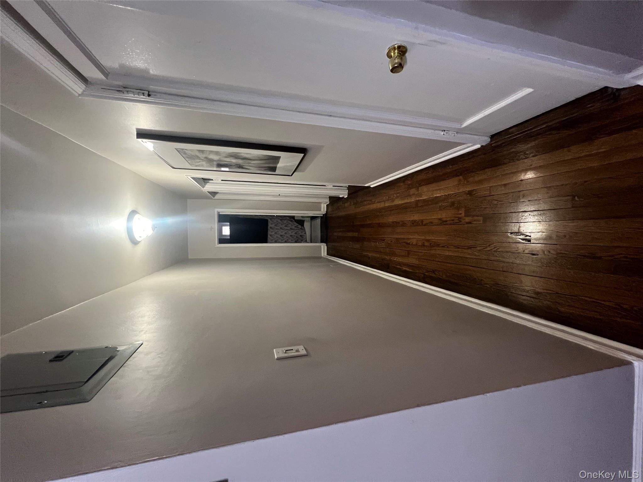 2080 Barnes Avenue, Unit 4C Bronx, NY 10462 - Photo 9 of 17 a view of hallway with stairs