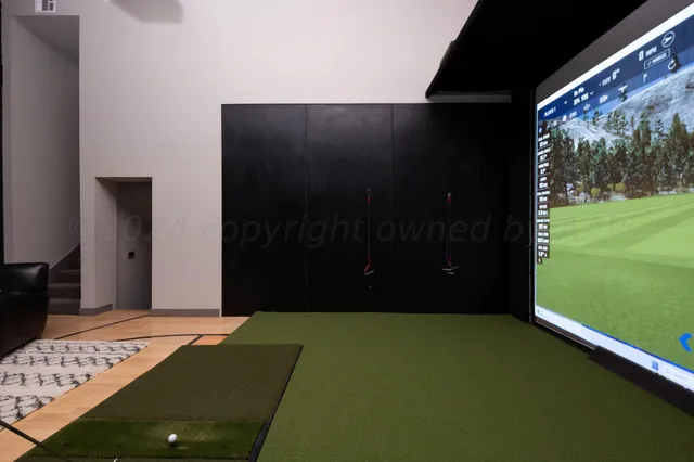 a front view of a house with a garden and pathway