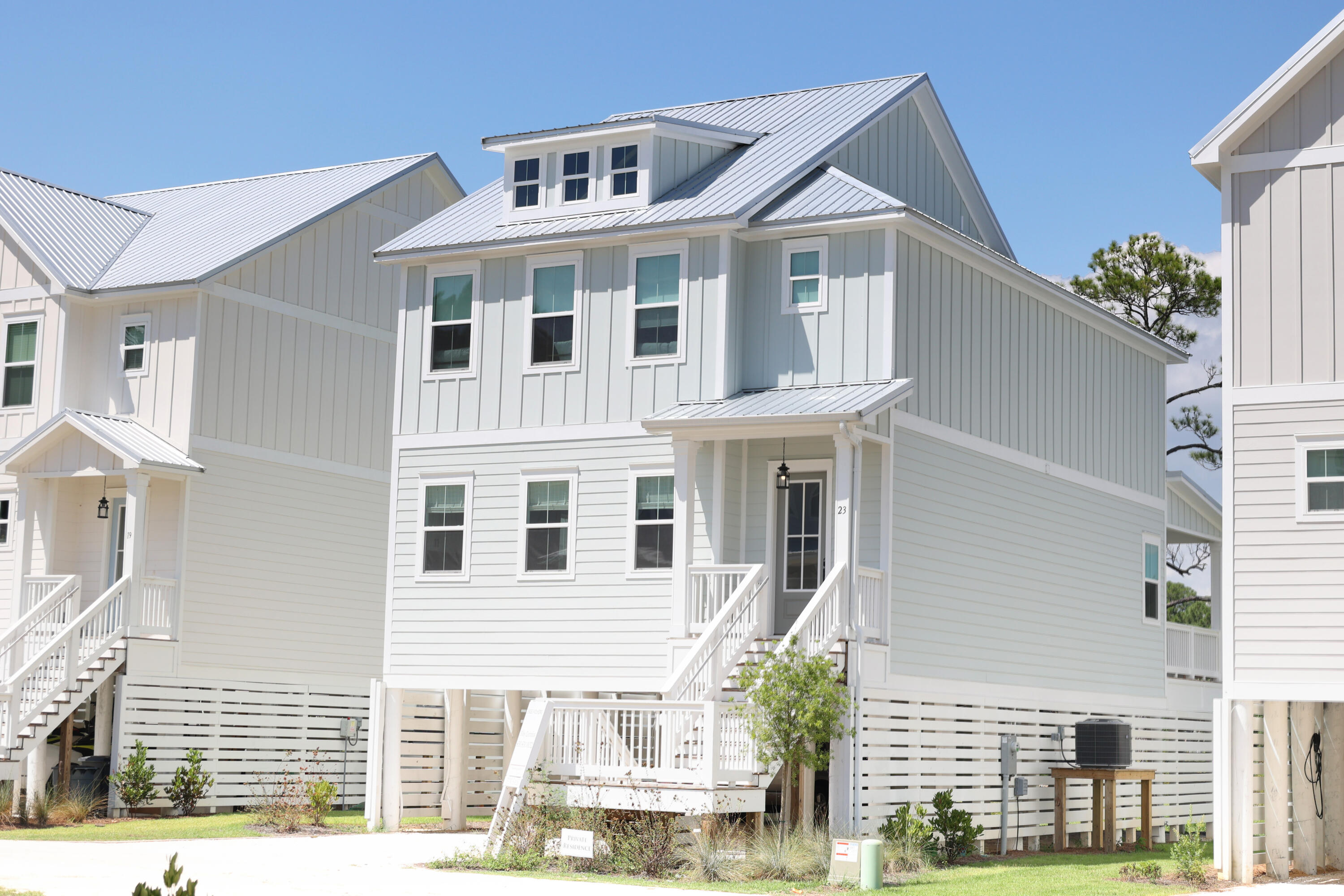 23 Tyler James Way Santa Rosa Beach, FL 32459 - Photo 15 of 47 a front view of a house with plants