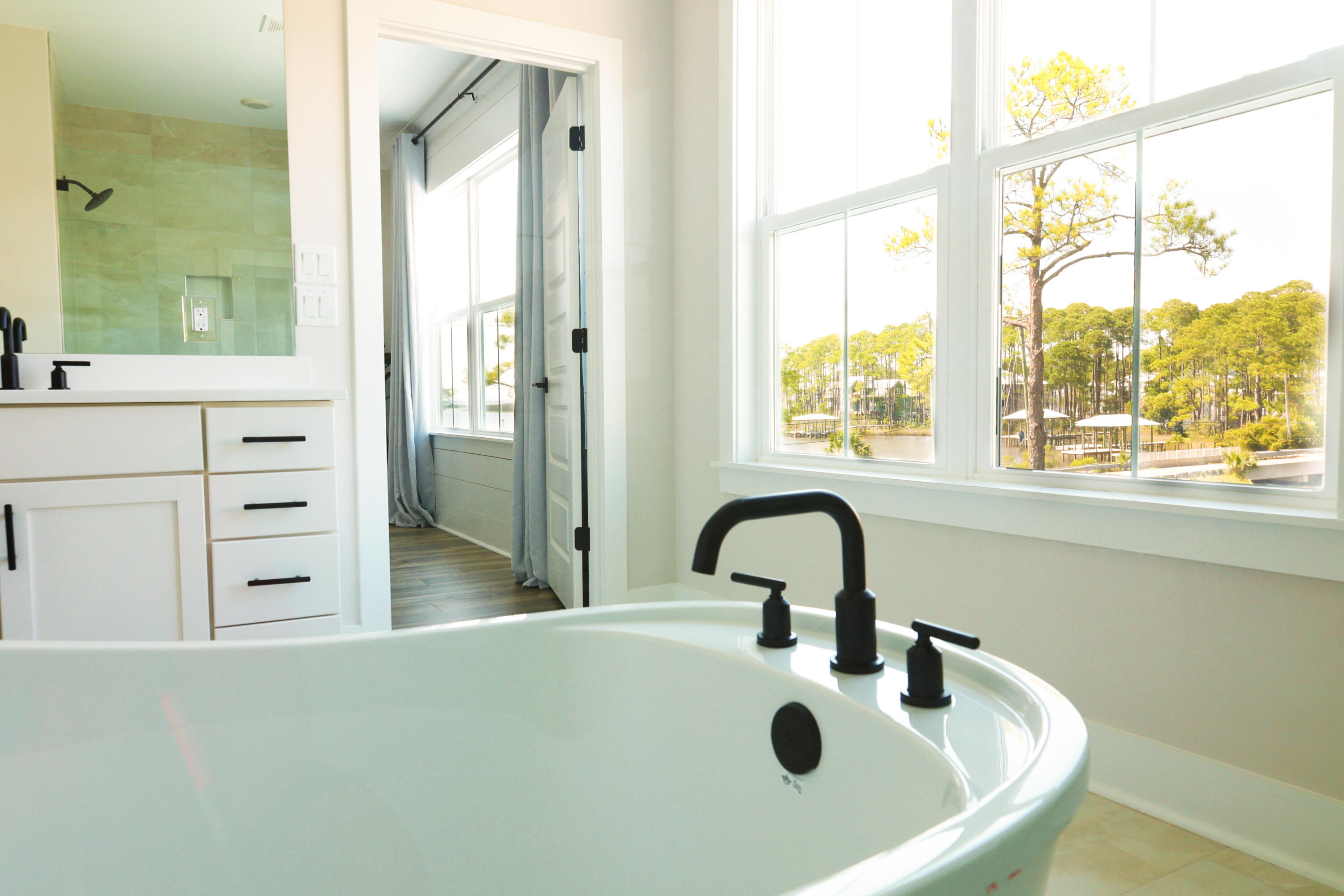 23 Tyler James Way Santa Rosa Beach, FL 32459 - Photo 4 of 47 a bathroom with a sink and mirror