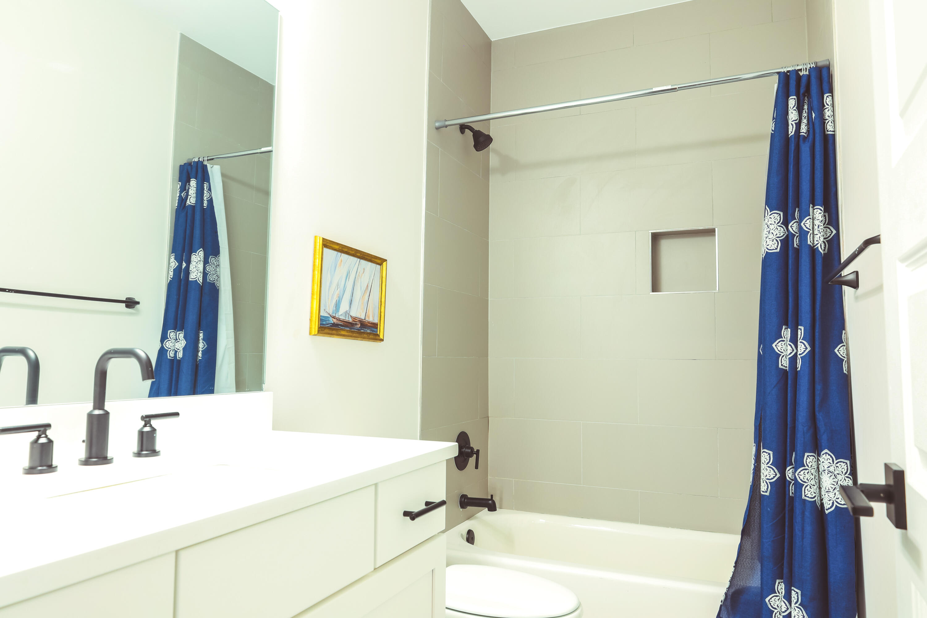 23 Tyler James Way Santa Rosa Beach, FL 32459 - Photo 41 of 47 a bathroom with a sink and a mirror