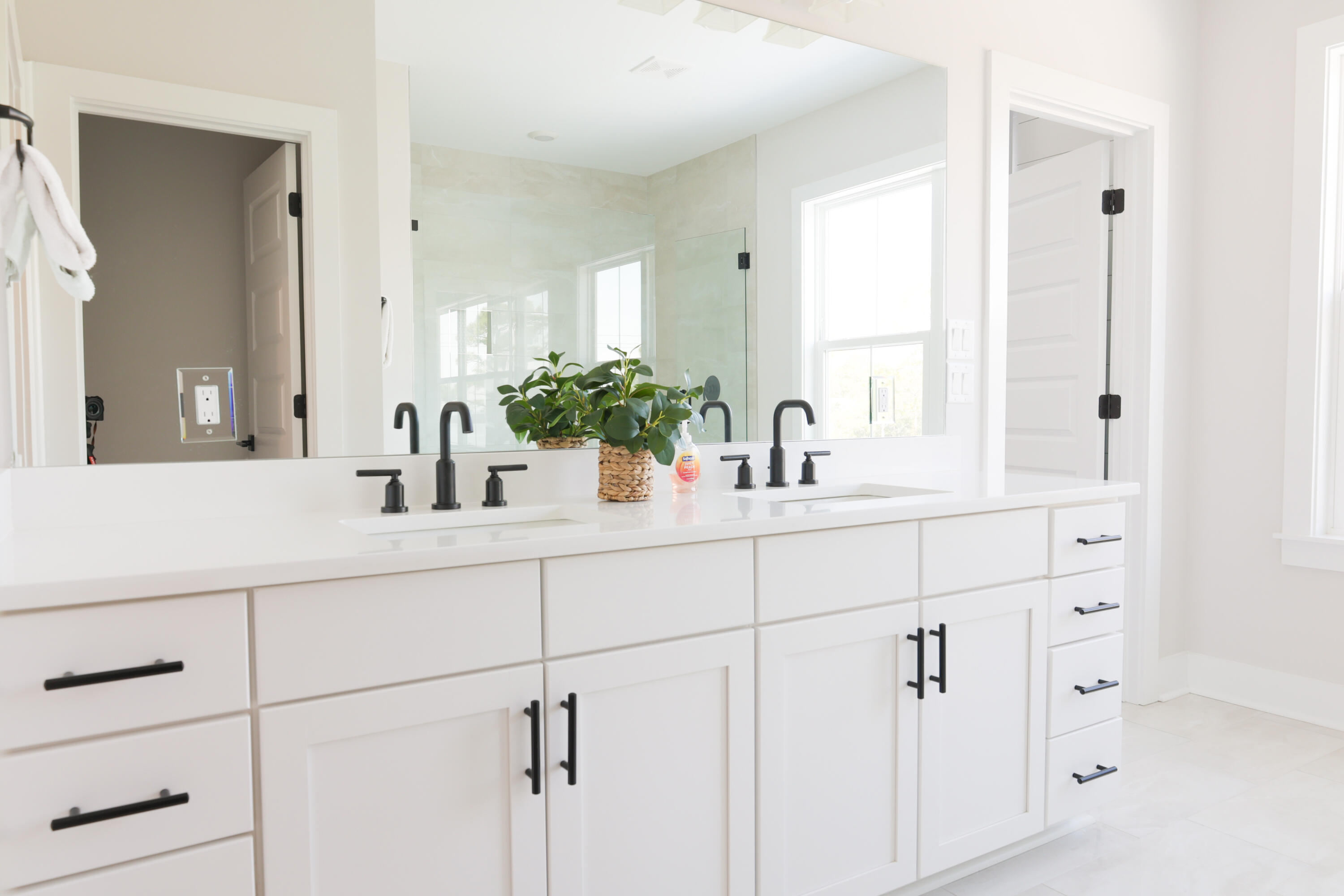 23 Tyler James Way Santa Rosa Beach, FL 32459 - Photo 5 of 47 a bathroom with a sink and a mirror