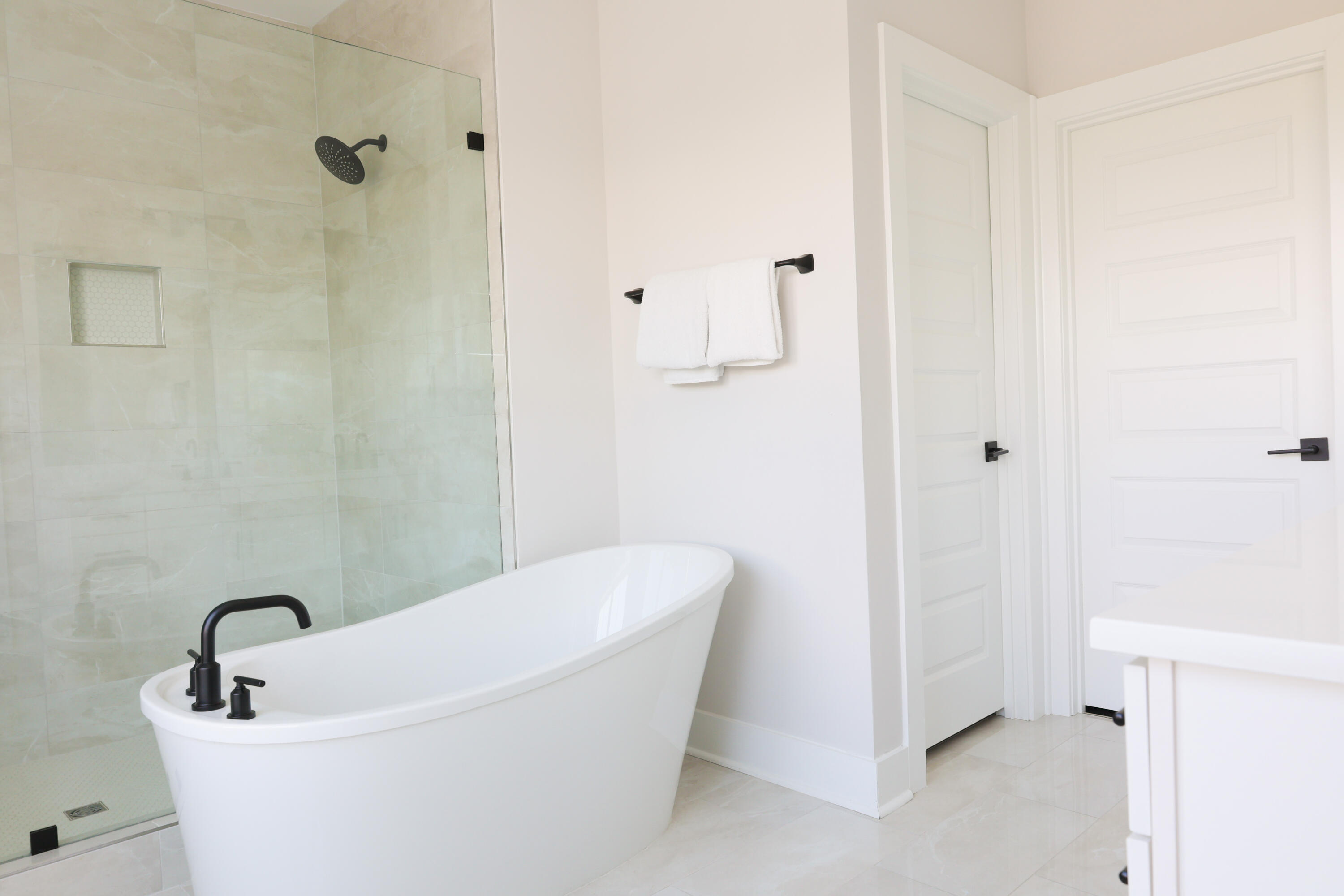 23 Tyler James Way Santa Rosa Beach, FL 32459 - Photo 6 of 47 a white bath tub sitting in a bathroom