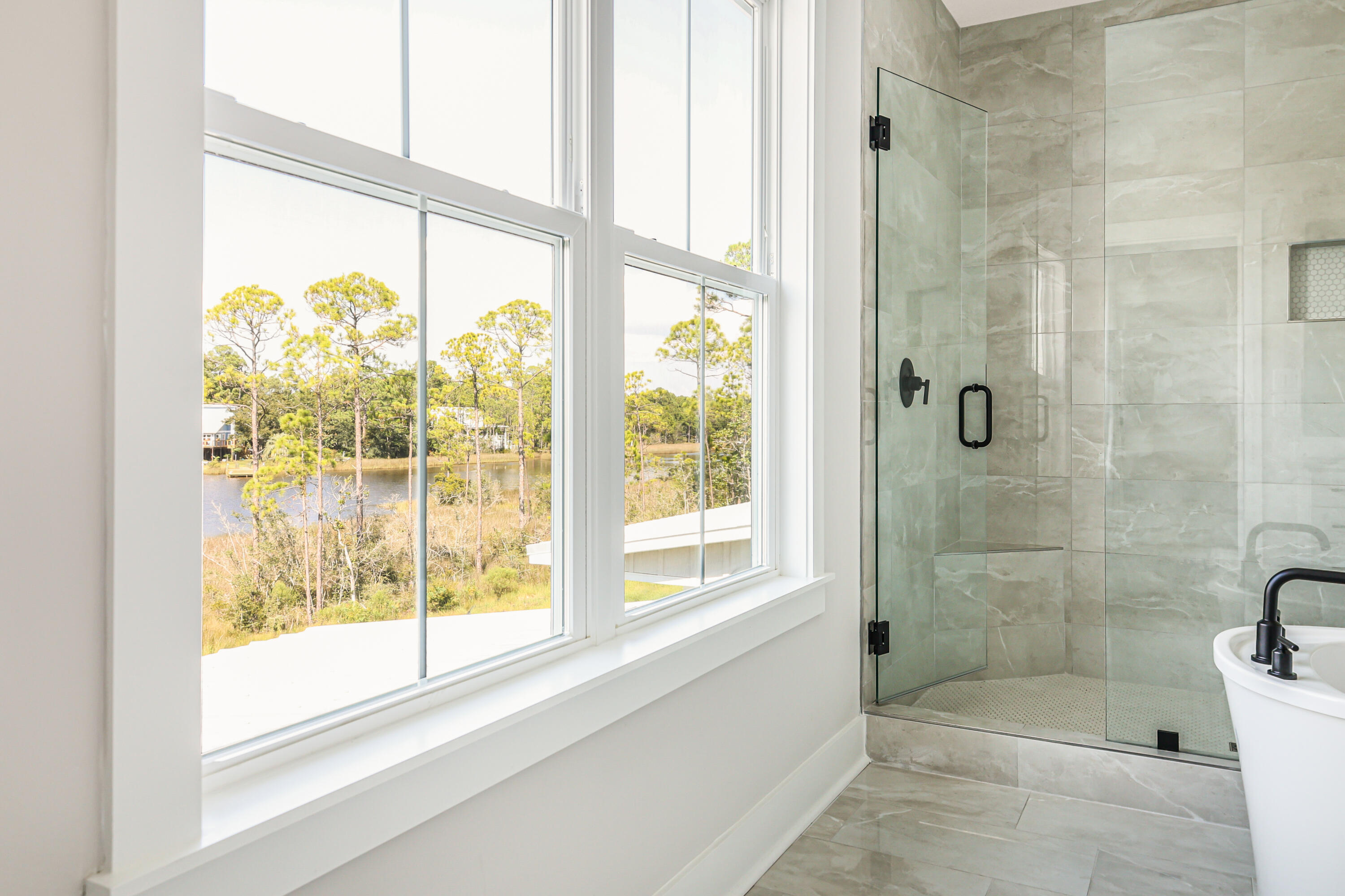 23 Tyler James Way Santa Rosa Beach, FL 32459 - Photo 7 of 47 a bathroom with a bathtub and shower