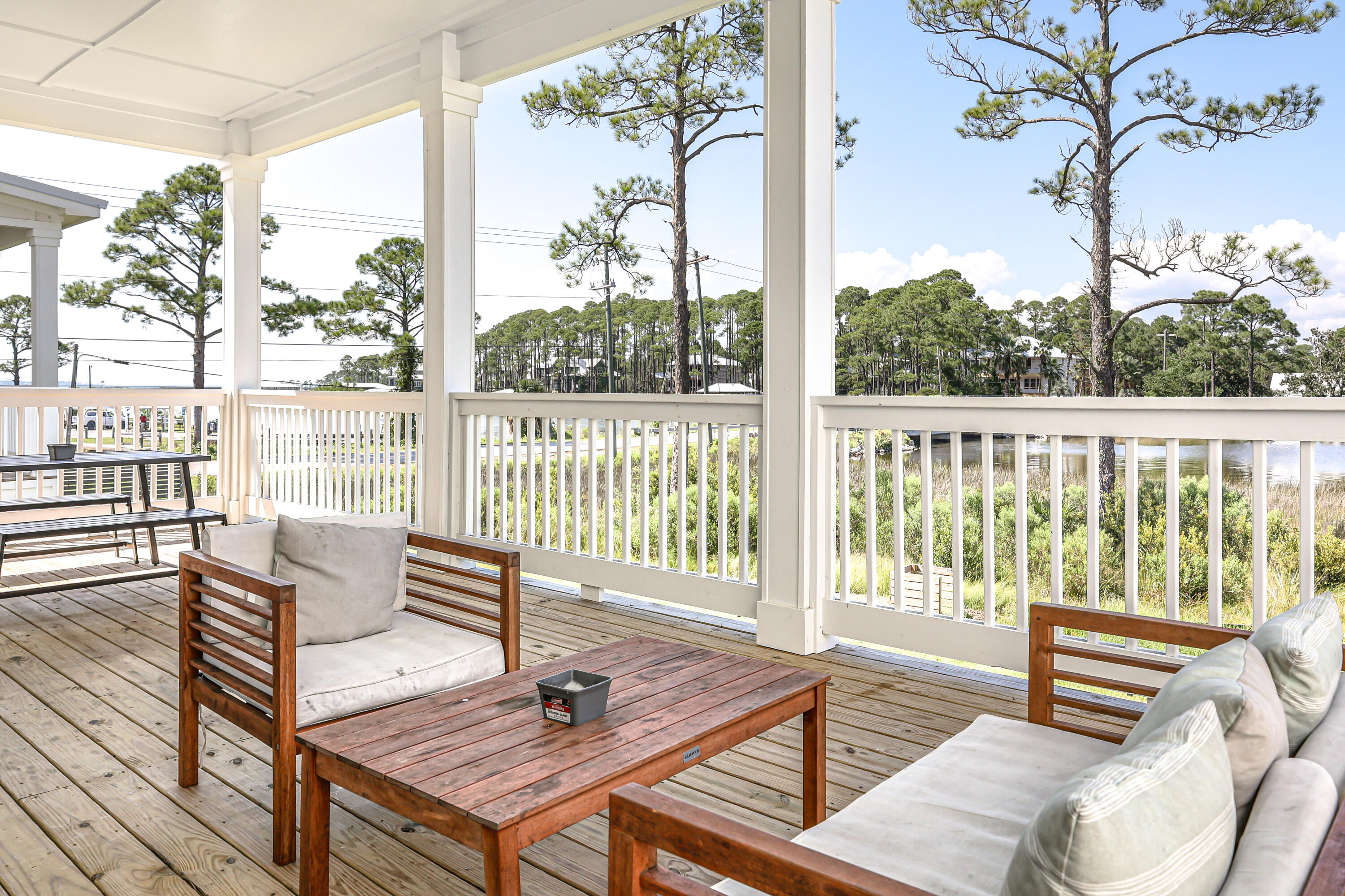 23 Tyler James Way Santa Rosa Beach, FL 32459 - Photo 8 of 47 a view of a patio with wooden floor