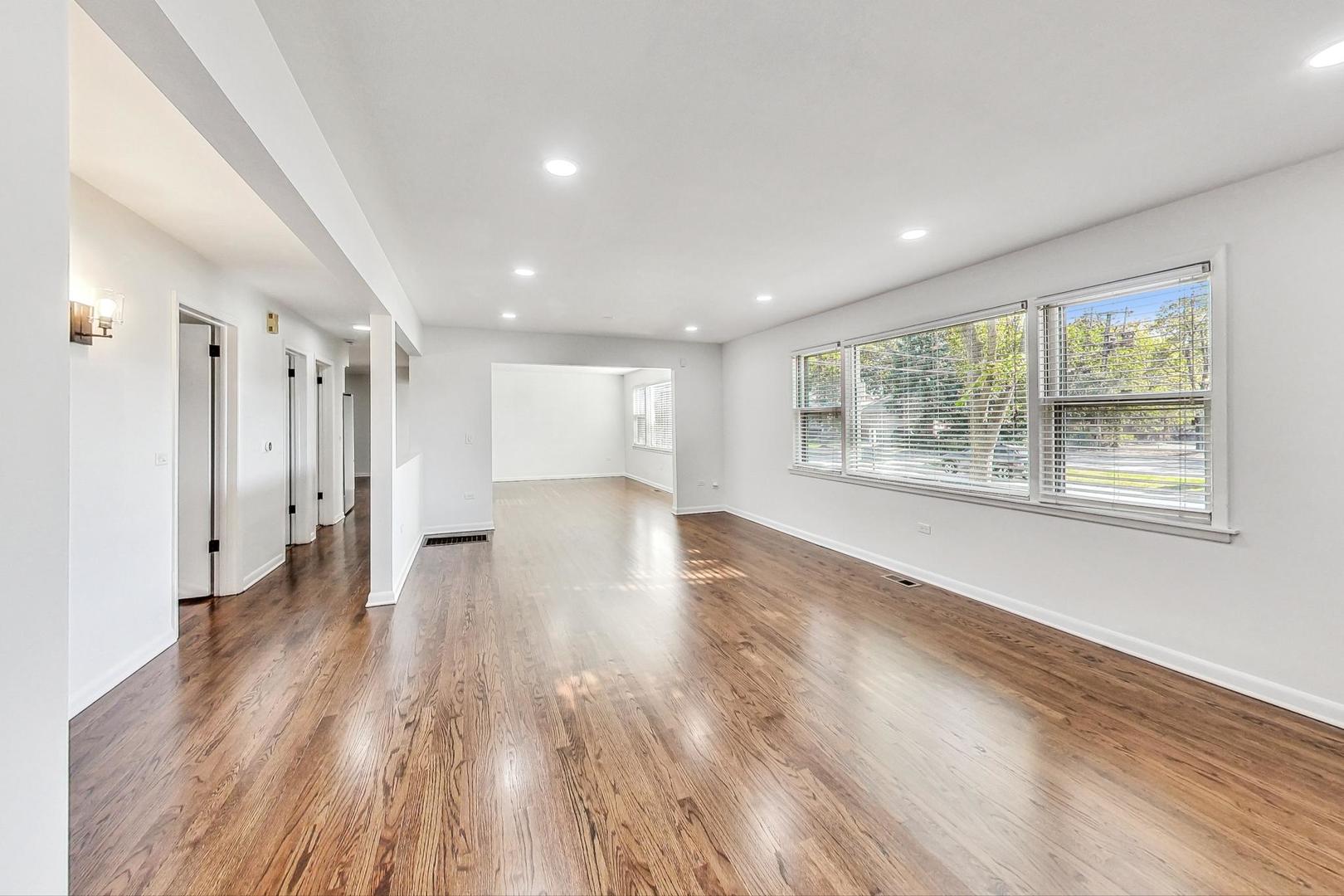 1108 Fortuna Avenue, Unit 1 Park Ridge, IL 60068 - Photo 21 of 39 a view of empty room with wooden floor and window