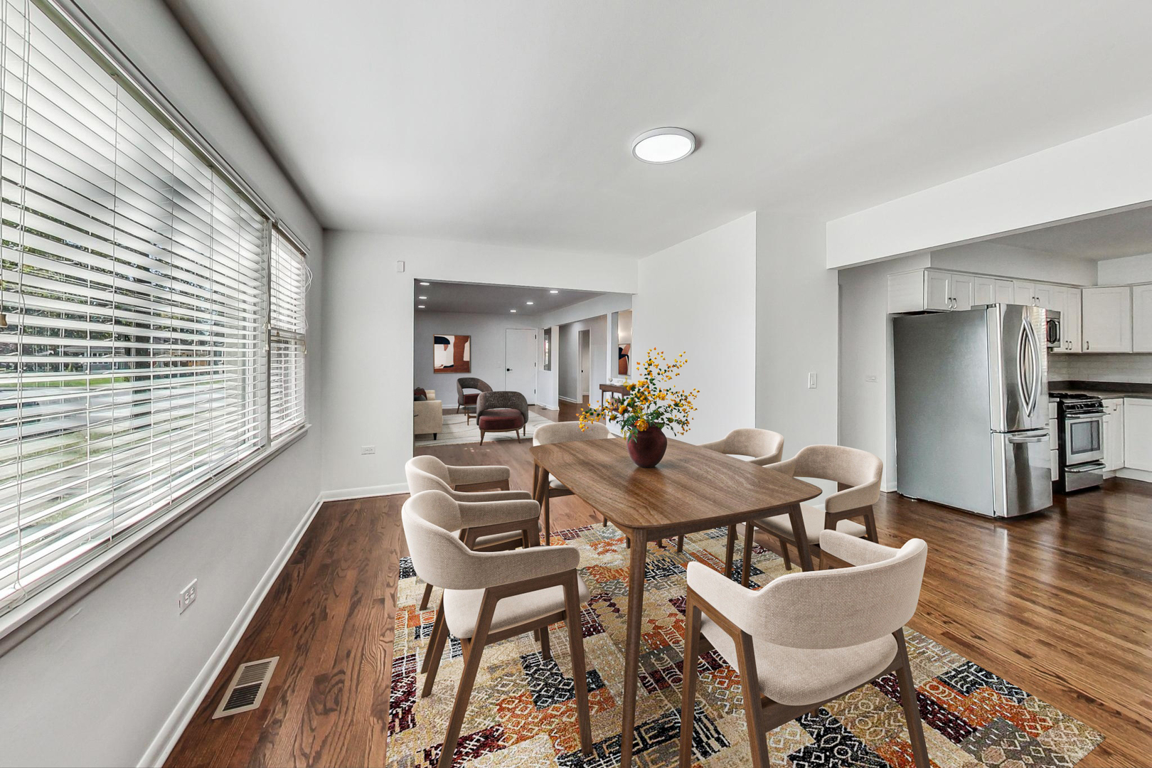 1108 Fortuna Avenue, Unit 1 Park Ridge, IL 60068 - Photo 7 of 39 a view of a dining room with furniture window and wooden floor