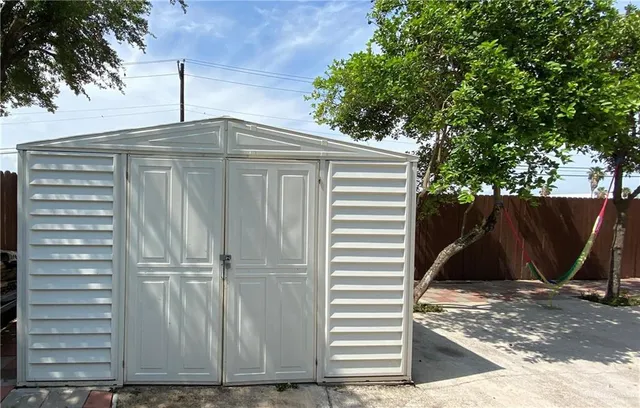 a house with trees in front of it