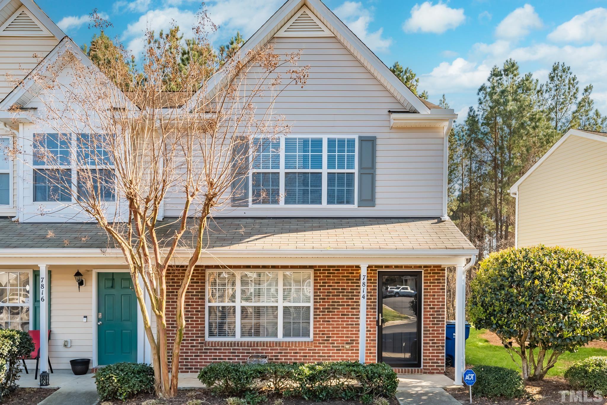 7814 Averette Field Drive Raleigh, NC 27616 - Photo 1 of 24 a front view of a house with a tree