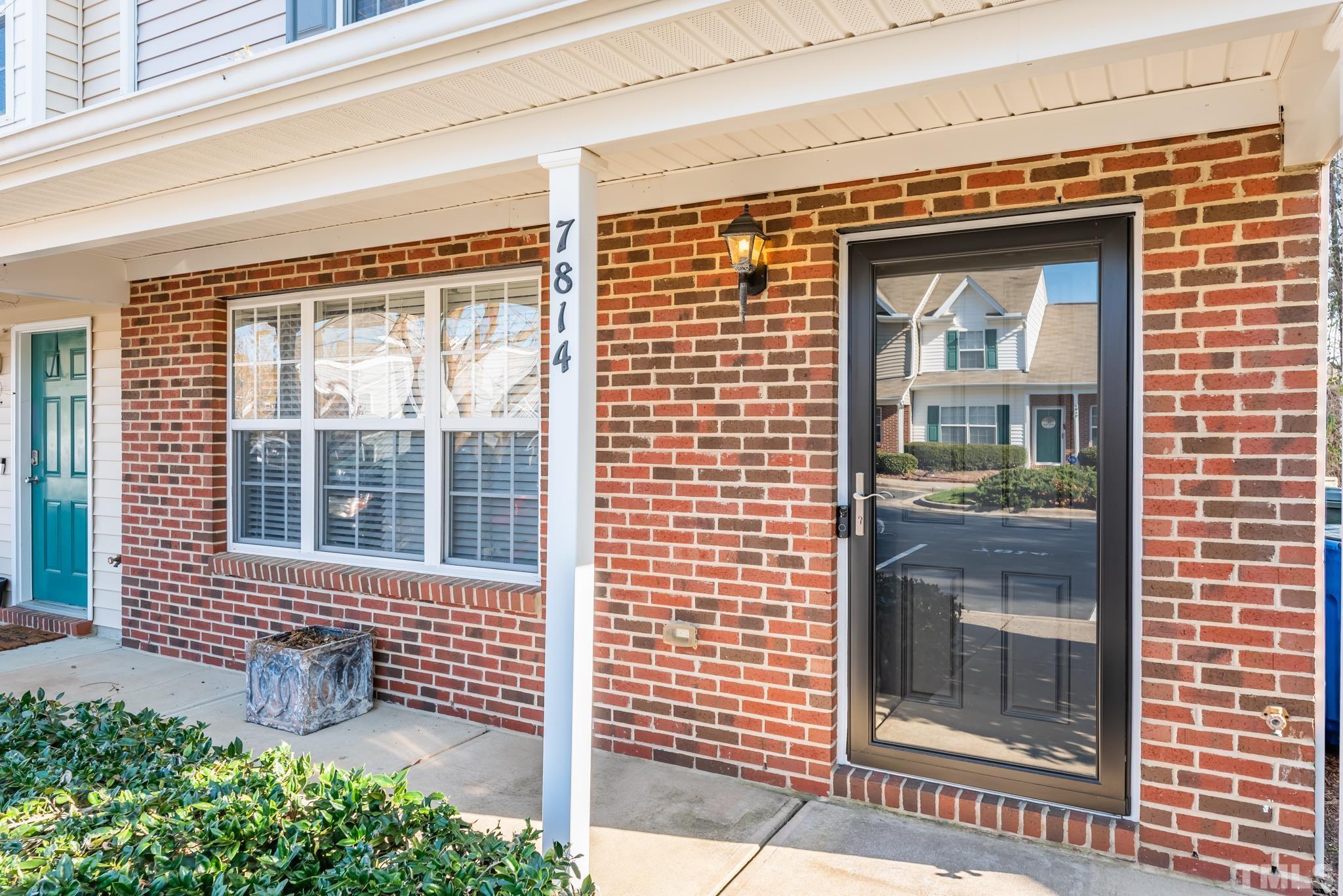 7814 Averette Field Drive Raleigh, NC 27616 - Photo 2 of 24 a front view of a house with a large windows