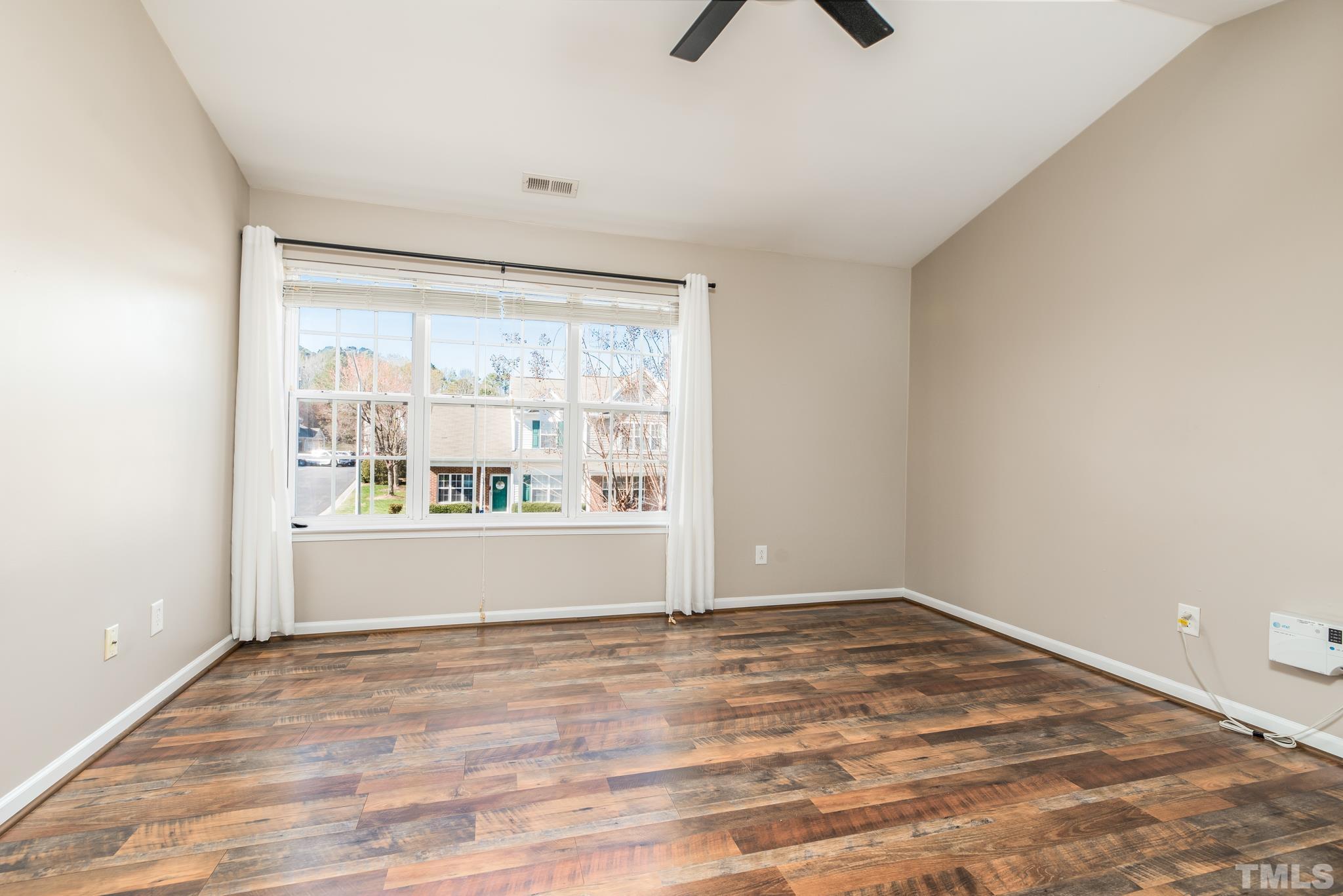 7814 Averette Field Drive Raleigh, NC 27616 - Photo 9 of 24 a view of empty room with window