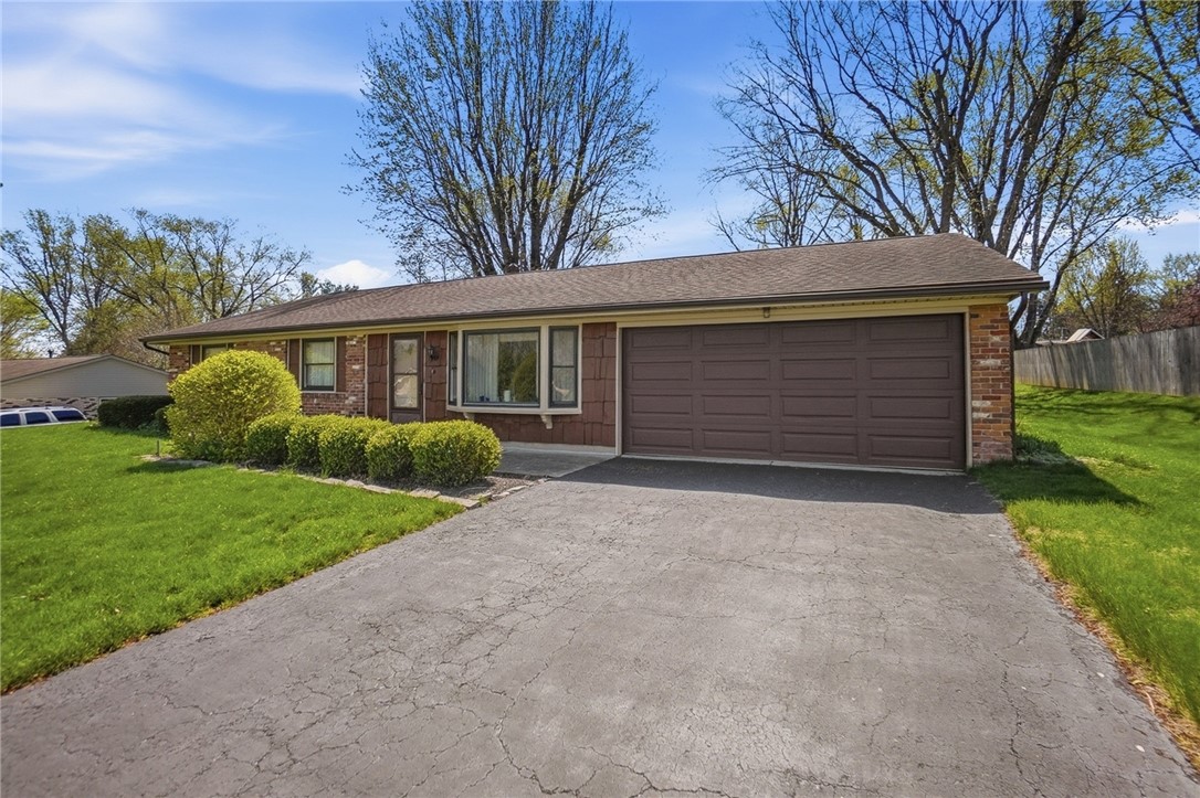 6225 Possum Run Road Bellbrook, OH 45305 - Photo 1 of 33 This ranch-style home features a spacious driveway and a well-maintained lawn.