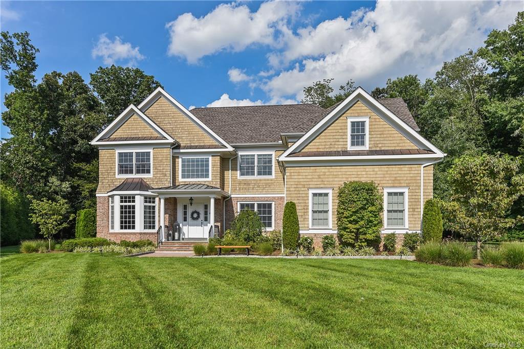 Welcome home to this stylish custom built Colonial located in Cambridge Court Community!