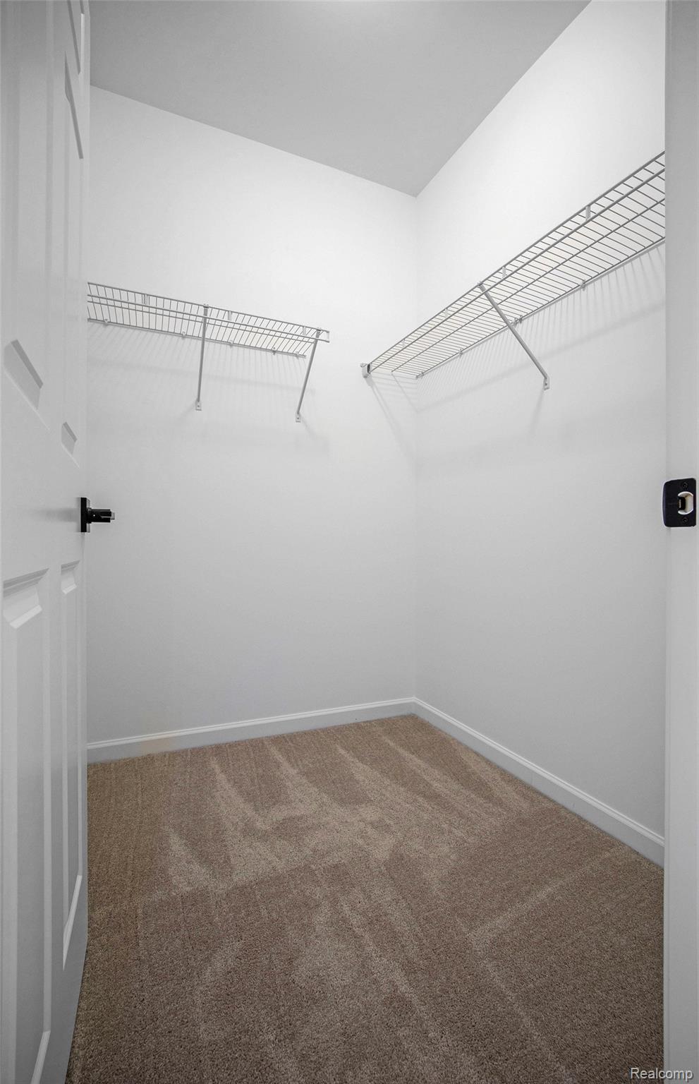 68788 Place Road New Haven, MI 48050 - Photo 12 of 29 Spacious closet featuring light carpet