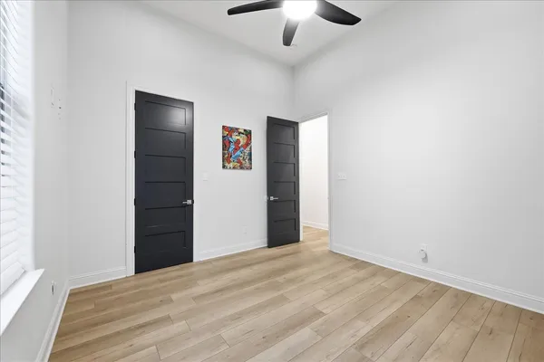 a view of a livingroom with wooden floor