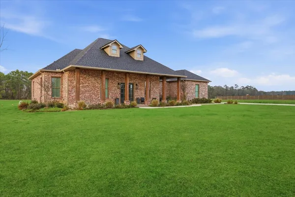 a front view of a house having yard