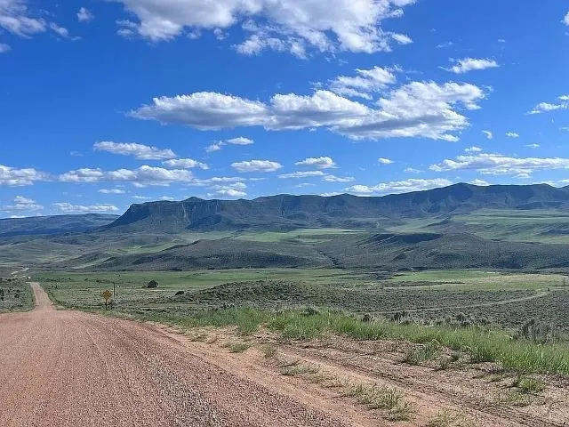 a view of a yard with an outdoor space