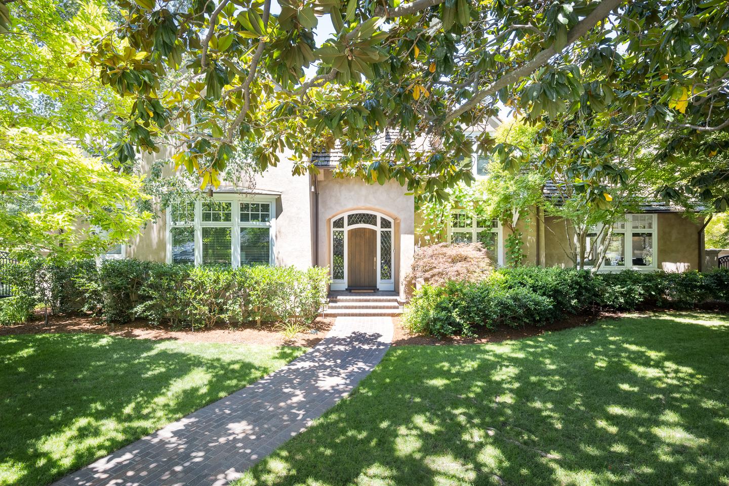 1585 Edgewood Drive Palo Alto, CA 94303 - Photo 1 of 1 a front view of a house with garden
