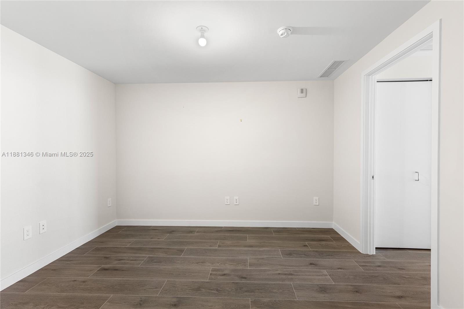1116 North Ocean Boulevard, Unit 1404 Pompano Beach, FL 33062 - Photo 35 of 80 a view of an empty room