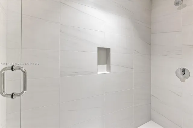 a view of a small space with wooden floor and closet