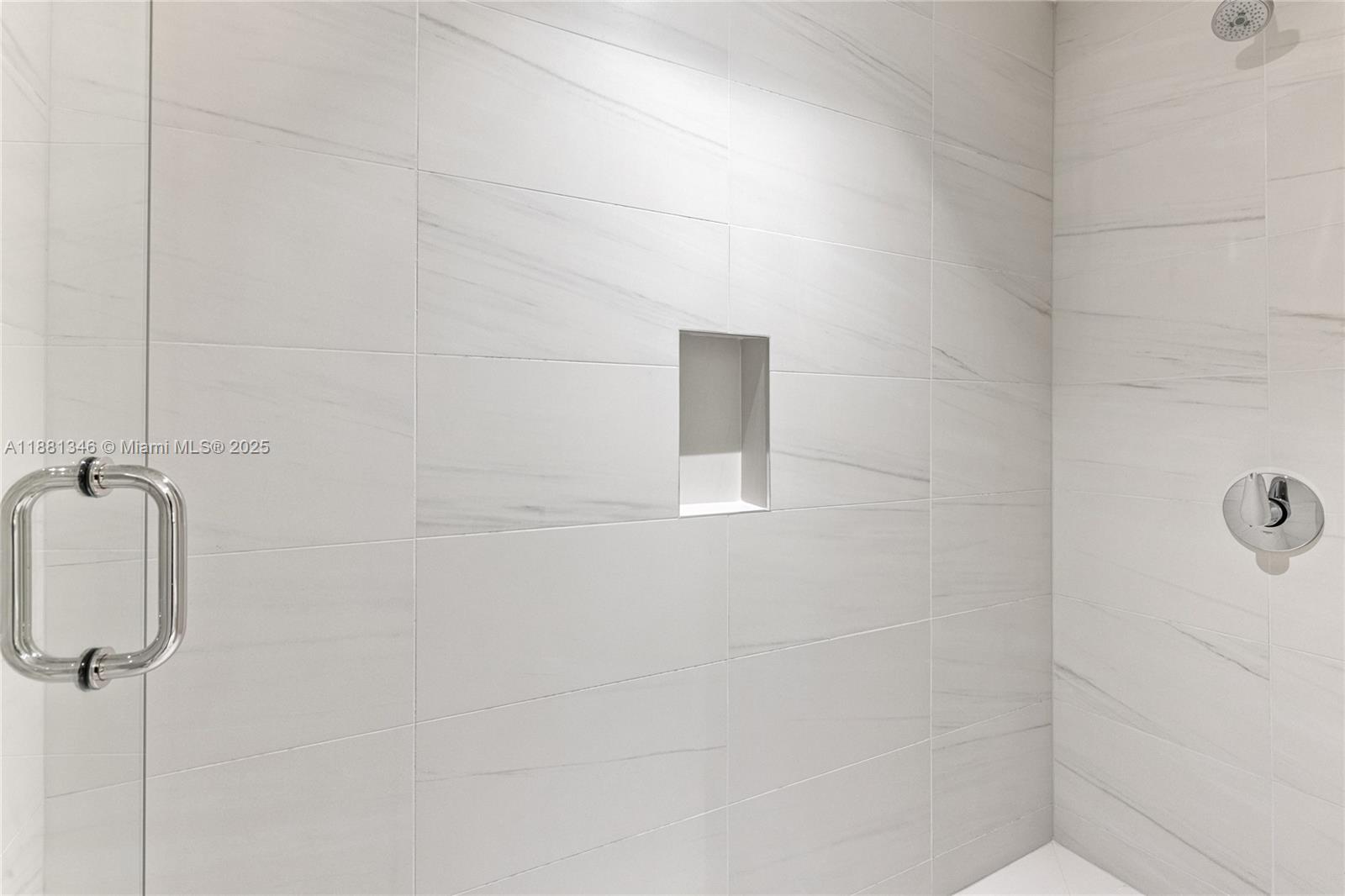 1116 North Ocean Boulevard, Unit 1404 Pompano Beach, FL 33062 - Photo 39 of 80 a bathroom with a shower