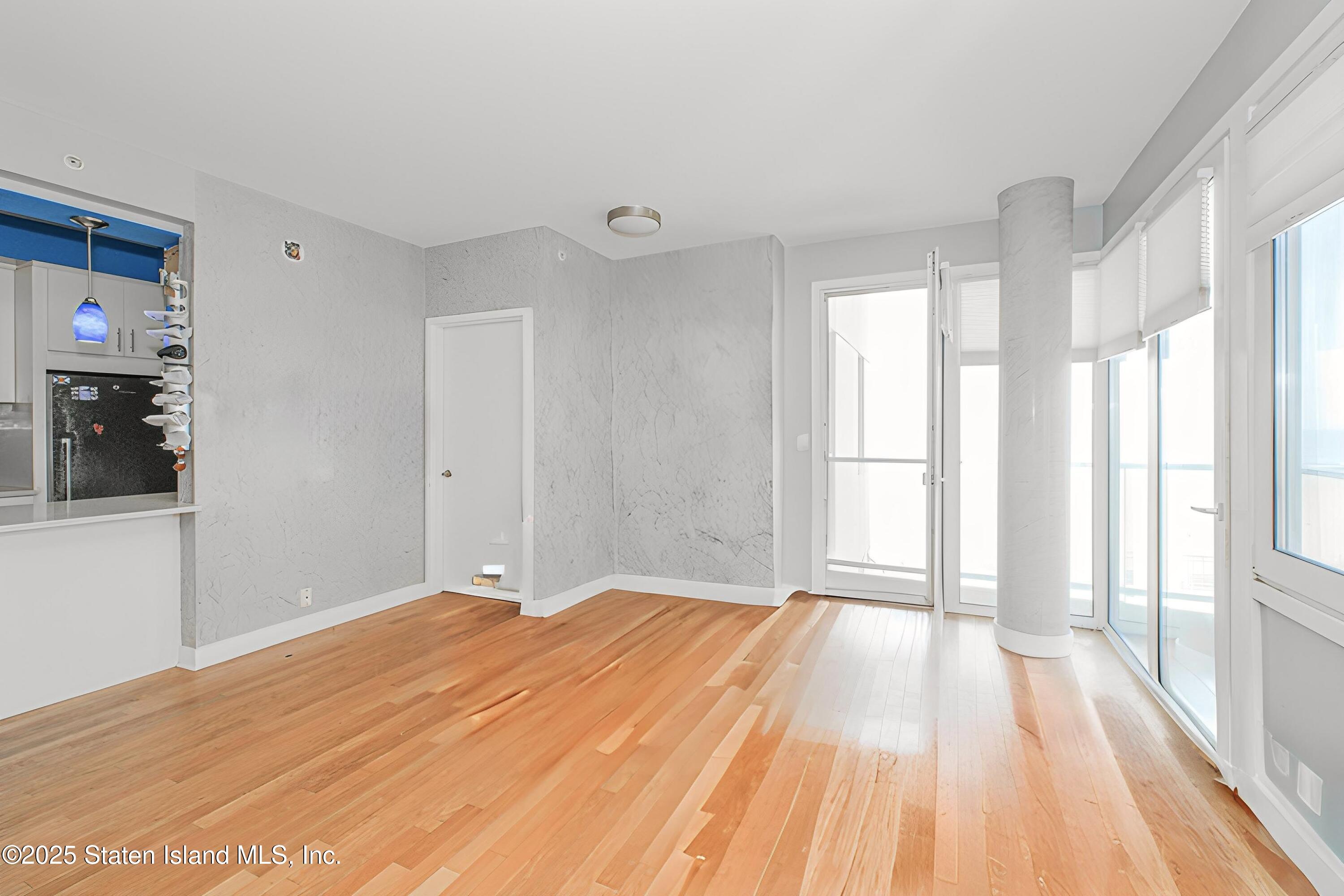 130 Beach 119th Street, Unit 3B Queens, NY 11694 - Photo 16 of 29 a view of an empty room with a window