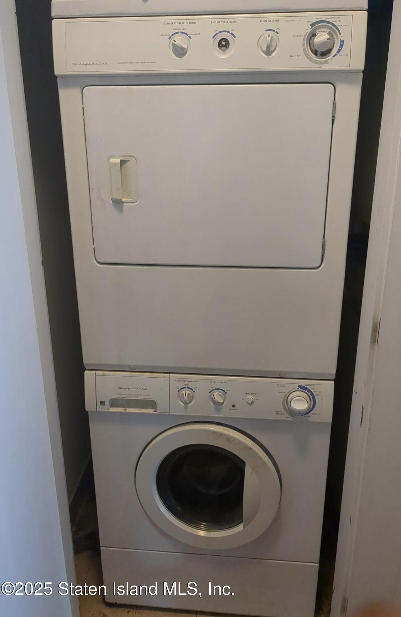 130 Beach 119th Street, Unit 3B Queens, NY 11694 - Photo 29 of 29 a utility room with dryer and washer