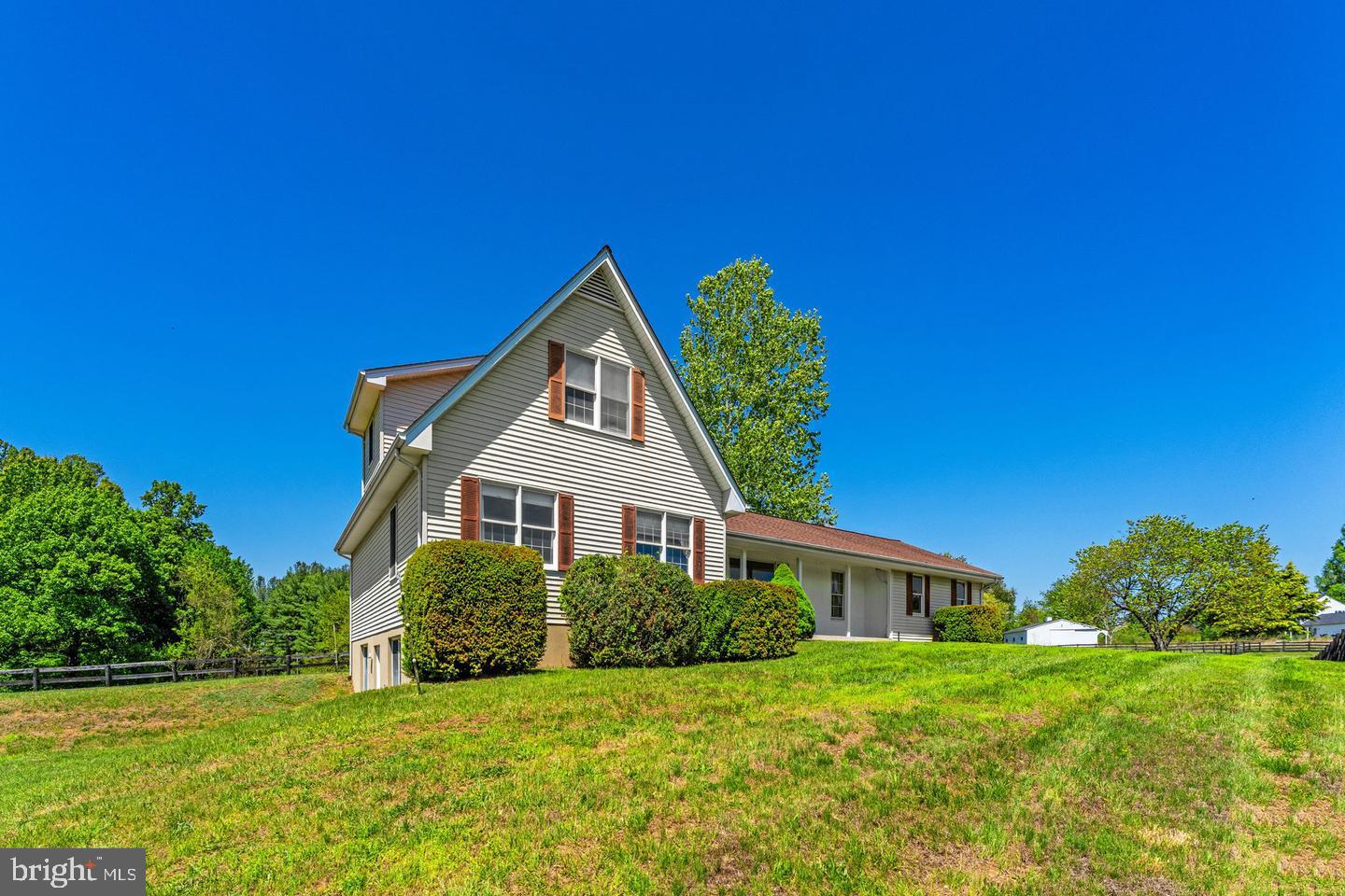 40297 Braddock Road Aldie, VA 20105 - Photo 2 of 34 a view of a house with a big yard