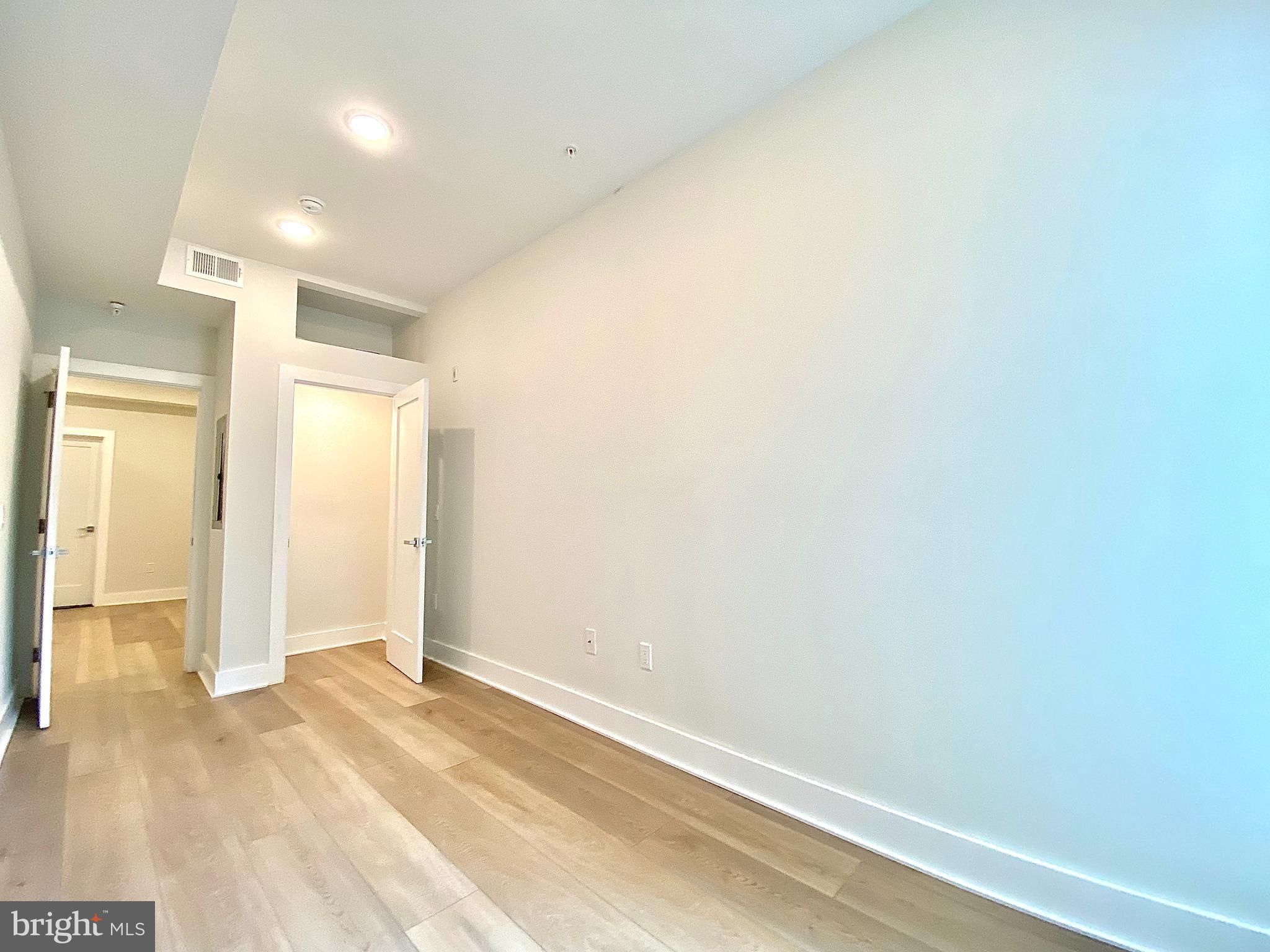 2216 Walnut Street, Unit 401 Philadelphia, PA 19103 - Photo 17 of 20 a view of an empty room