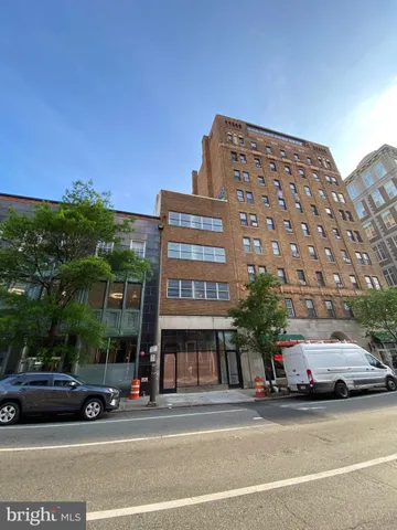 a view of a cars parked in front of a building
