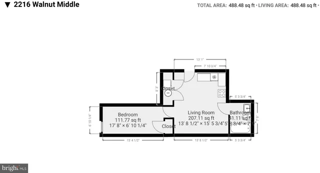 a picture of a bench in front of a wall