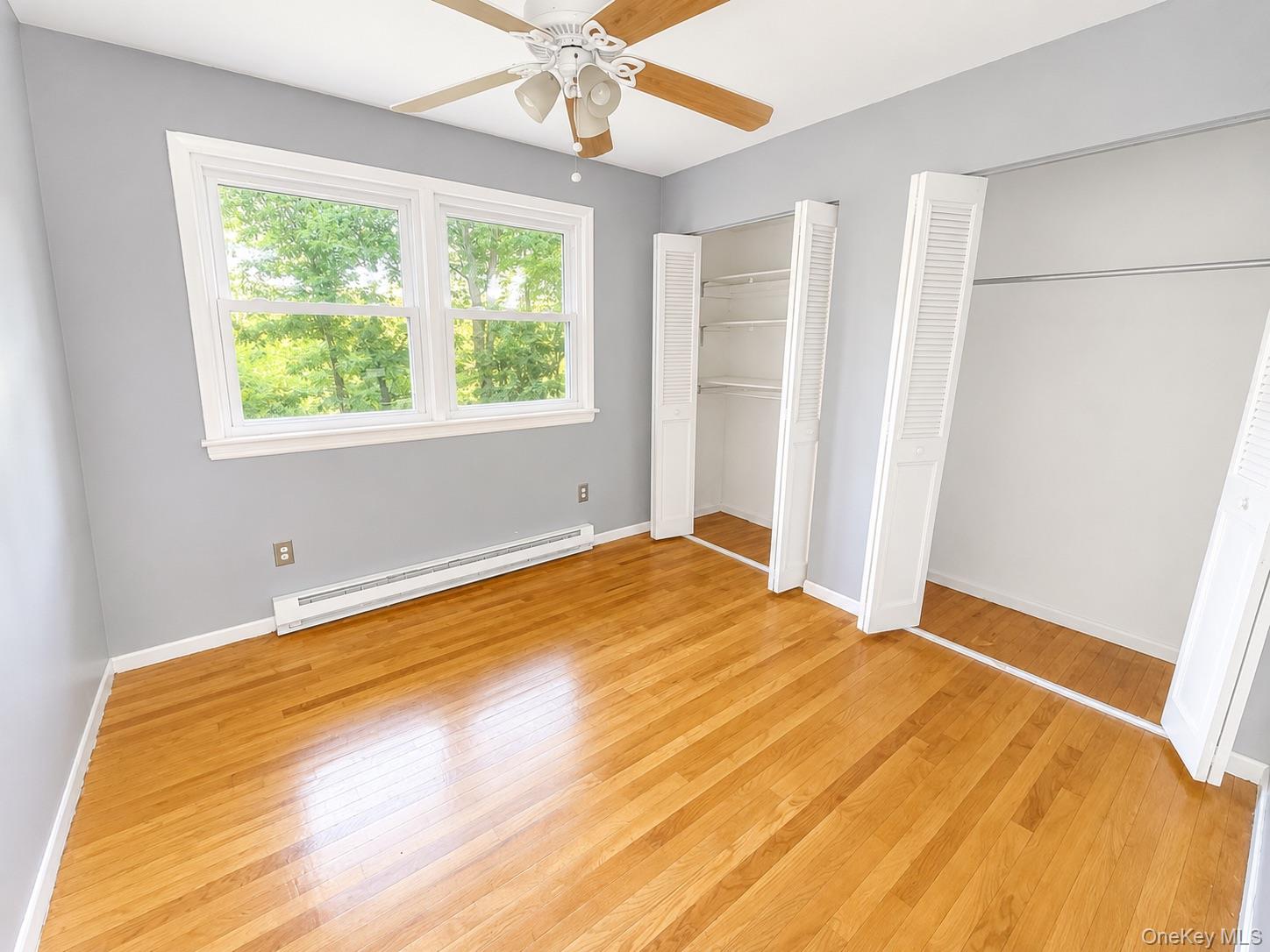 43 Glenmere Homesites Road, Unit 2F Florida, NY 10921 - Photo 12 of 15 Hardwood flooring extending throughout the room