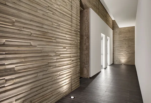 a view of a room with wooden walls