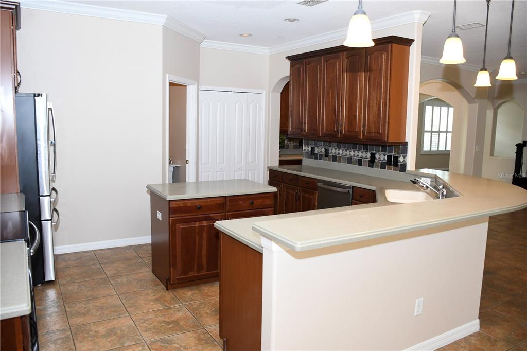 557 Palio Court Ocoee, FL 34761 - Photo 8 of 18 a utility room with dryer and washer