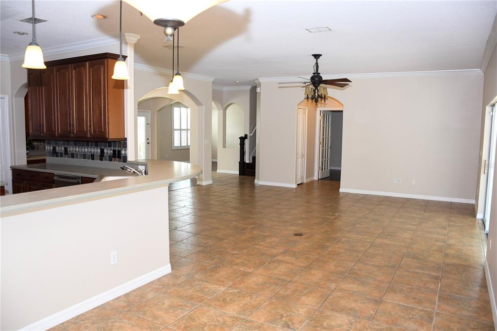 557 Palio Court Ocoee, FL 34761 - Photo 10 of 18 a view of a kitchen with granite countertop a sink and dishwasher