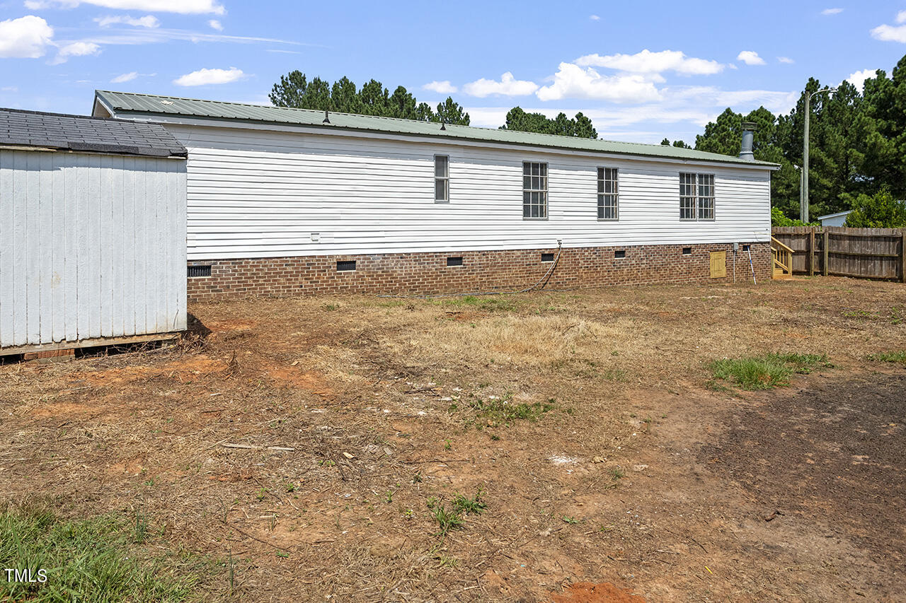 10335 West Old Spring Hope Road Spring Hope, NC 27882 - Photo 19 of 20 front view of house next to a yard