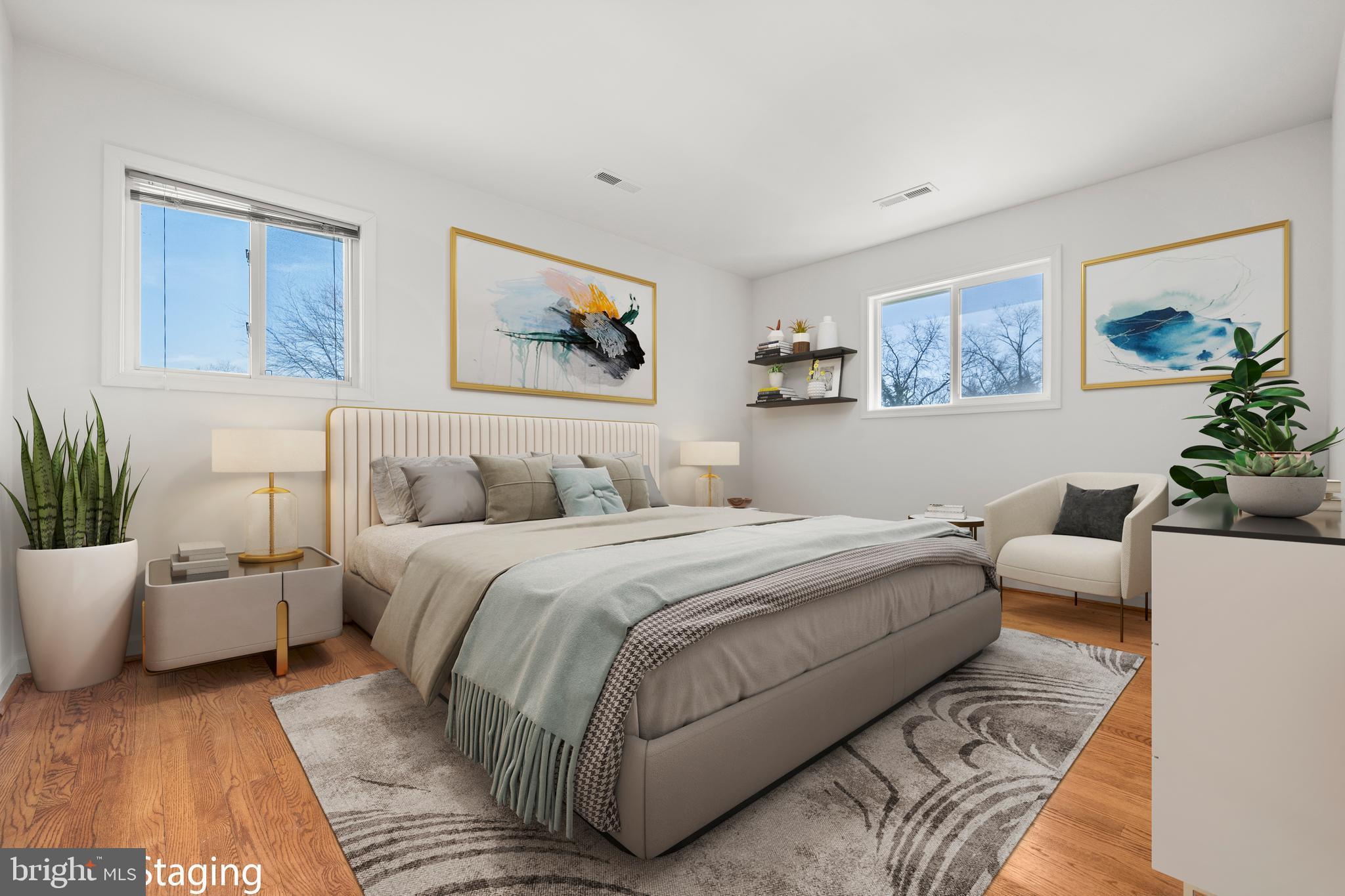 8100 Oxon Hill Road Fort Washington, MD 20744 - Photo 20 of 40 a bed room with a bed and a couch