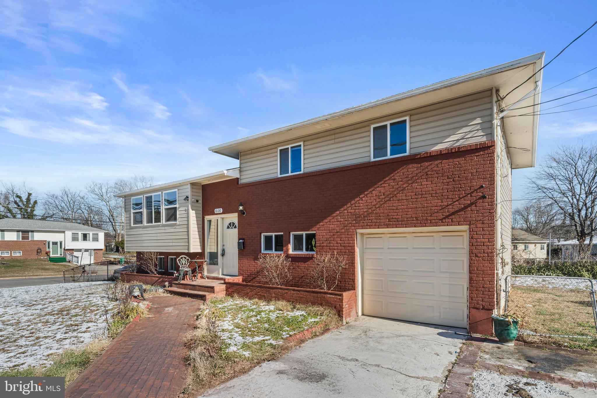 8100 Oxon Hill Road Fort Washington, MD 20744 - Photo 39 of 40 a front view of a house with cars parked
