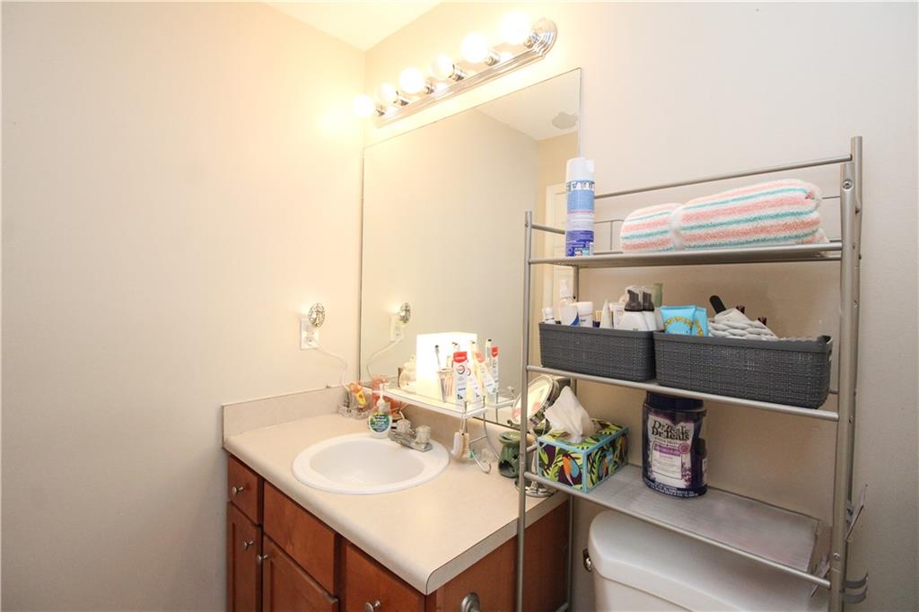 3620 Ginnis Road, Unit 4 Atlanta, GA 30331 - Photo 12 of 17 a bathroom with a sink and a mirror