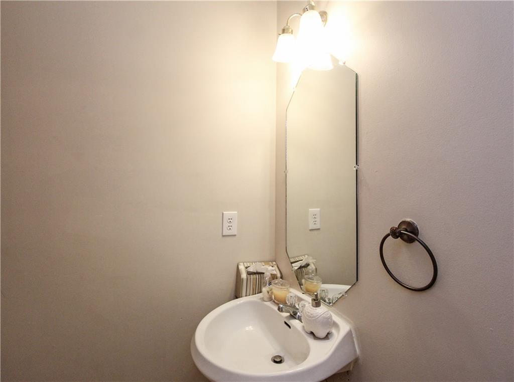 3620 Ginnis Road, Unit 4 Atlanta, GA 30331 - Photo 13 of 17 a bathroom with a sink vanity and mirror