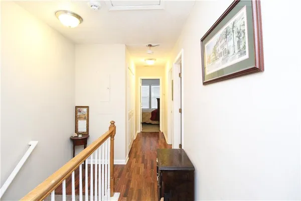 a view of a hallway view with staircase