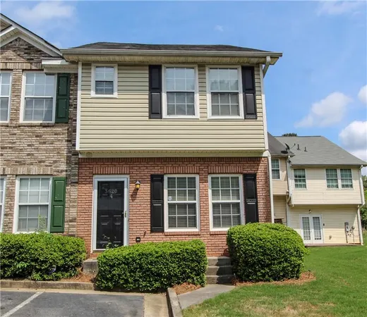 a front view of a house having yard