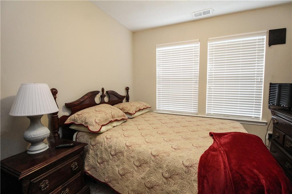 3620 Ginnis Road, Unit 4 Atlanta, GA 30331 - Photo 8 of 17 a bedroom with a bed and a window